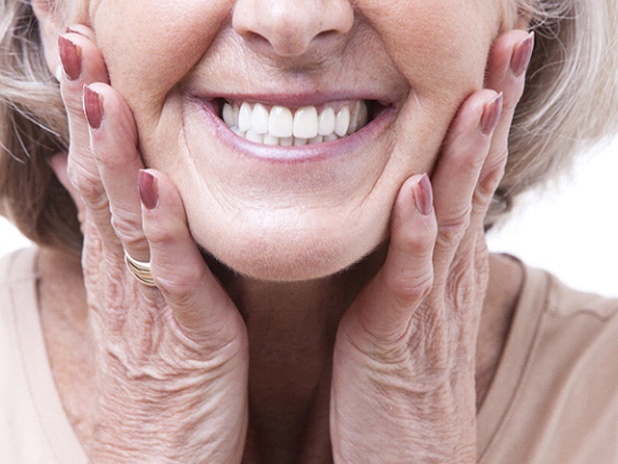 Closeup of woman smiling with dentures in Florence