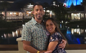 Doctor Nikoonezhad and his wife outdoors at nighttime