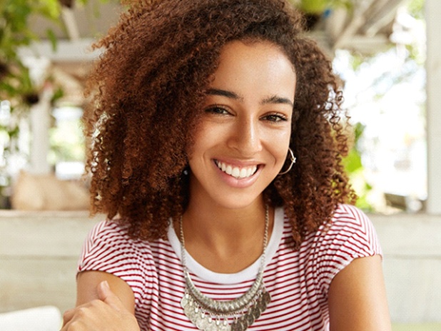 woman smiling after getting veneers in Florence